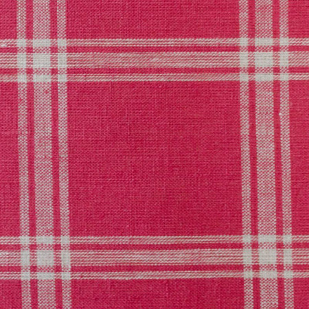 Ecru checkered linen fabric on a red background