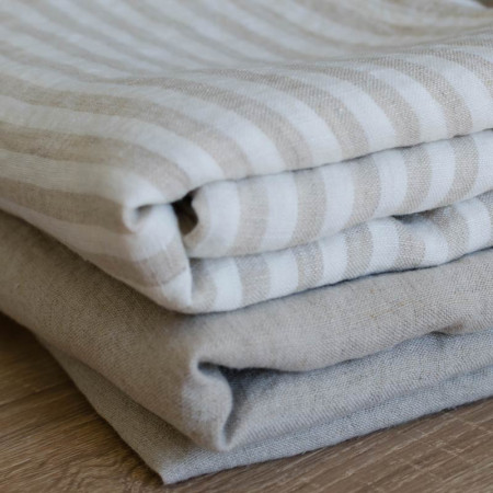 Washed linen fabric with white and ecru vertical stripes